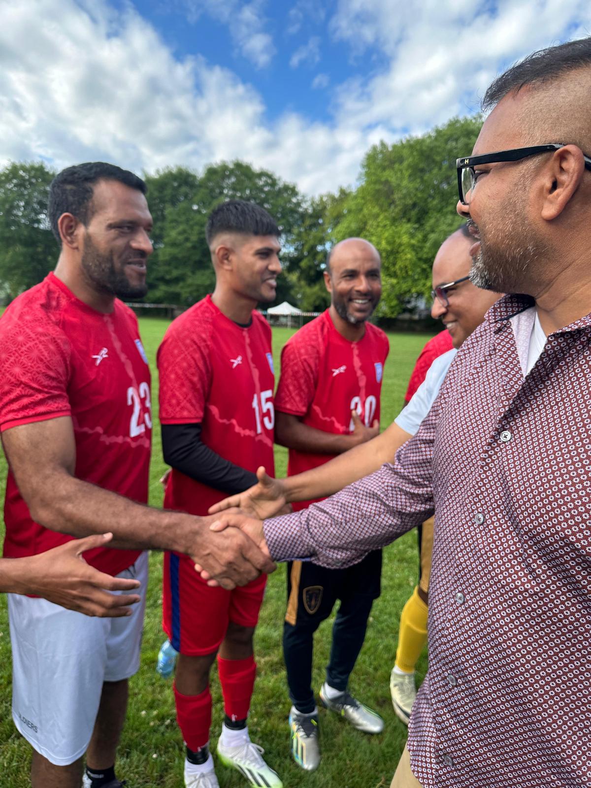 Hafiz meeting soccer players